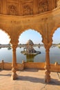 Old jain cenotaphs on lake in jaisalmer india Royalty Free Stock Photo