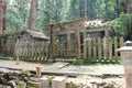 Old japanese crypt behind a traditional gate Royalty Free Stock Photo