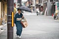An old Japanese woman in a kimono