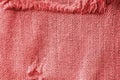 Old jeans texture close up, top view. Denim background, red color toned Royalty Free Stock Photo