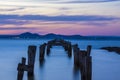 Old jetty with mountains backdrop