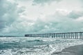 Old jetty over the stormy sea Royalty Free Stock Photo