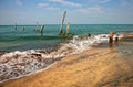 Old jetty pillars in sea Royalty Free Stock Photo