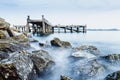 Old jetty and rocks Royalty Free Stock Photo