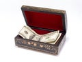 Old jewelry box with money inside Royalty Free Stock Photo