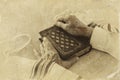 Old Jewish man hands holding a Prayer book, praying, next to tallit. Jewish traditional symbols. Rosh hashanah (jewish New Year h Royalty Free Stock Photo