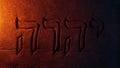 Hebrew Word Yahweh Rock Carving In Firelight