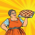 Old joyful retro woman with berry pie