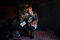 Old kazakh eagle hunter with his golden eagle Royalty Free Stock Photo