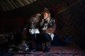 Old kazakh eagle hunter with his golden eagle Royalty Free Stock Photo