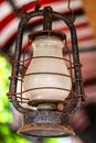 Old kerosene lamp rusty closeup vertical photo street lighting