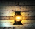 Old kerosene lantern burning Royalty Free Stock Photo