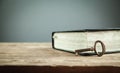 Old key with bible. Concept of wisdom and knowledge Royalty Free Stock Photo