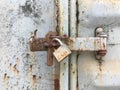Old key lock on rusty freight container Royalty Free Stock Photo