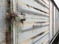 Old key lock on rusty freight container Royalty Free Stock Photo