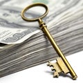 Old Key on Money Royalty Free Stock Photo