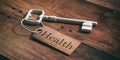 Old key with tag health on a wooden background. 3d illustration Royalty Free Stock Photo