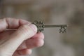 Old key in woman hand. Confidentiality concept. Business success concept Royalty Free Stock Photo