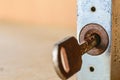 Old keyhole with key Royalty Free Stock Photo