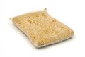 Old kitchen sponge on white background. Royalty Free Stock Photo