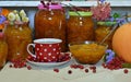 Old kitchen still life witch cooking pumpkin jam concept