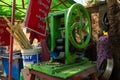 An old kneeling machine for crushing sugar cane