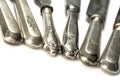 Old knife handles made of silver of various cutlery, isolated on Royalty Free Stock Photo