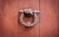 An old Knocker on a red door Royalty Free Stock Photo