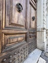 old knockers on wooden door of a building Royalty Free Stock Photo