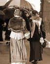 Old ladies dressed in vintage clothes with sepia effect