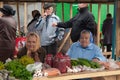 Old ladies selling vegetables on a street market in Irkutsk, Russia
