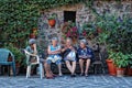 Old ladies gathering in the main square in Radicofani, Tuscany. Royalty Free Stock Photo