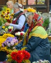 Old lady babushkas selling flowers