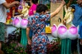 Old Lady Bathing the Buddha During Vesak Day