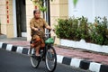 Old lady driving bycicle