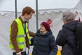 Old lady getting help at the Tesco Ukrainian refugee centre