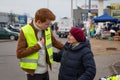 Old lady getting help at the Tesco Ukrainian refugee centre