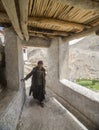 Old lady going for prayers in Monastery near Lamayuru in Ladakh, India Royalty Free Stock Photo