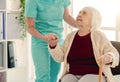 Old lady leaning on nurse hand Royalty Free Stock Photo