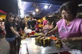 Old lady pane-fried soft bread at PJ Pasar Malam