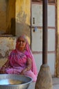Old Lady in Sari outside Historic Haveli, Nawalgarh, Rajasthan, India