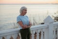 Caucasian elderly woman at daily fitness regime outdoors Royalty Free Stock Photo