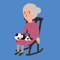 Old lady woman senior with cat sleeping in her lap sitting in chair Royalty Free Stock Photo