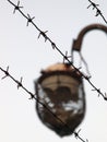 Old lamp and barbed wire Royalty Free Stock Photo