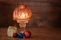 Old lamp with christmas ornaments Royalty Free Stock Photo