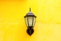 Old lamp lantern on the stone wall Royalty Free Stock Photo