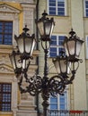 An old lamp post in a European city. Street lights Royalty Free Stock Photo