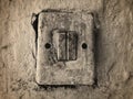 An old lamp switch mounted on the wall Royalty Free Stock Photo