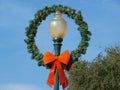 An Old Lamppost with Wreath and Ribbon Bow Royalty Free Stock Photo