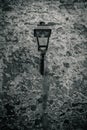 an old lantern on a stone wall Royalty Free Stock Photo